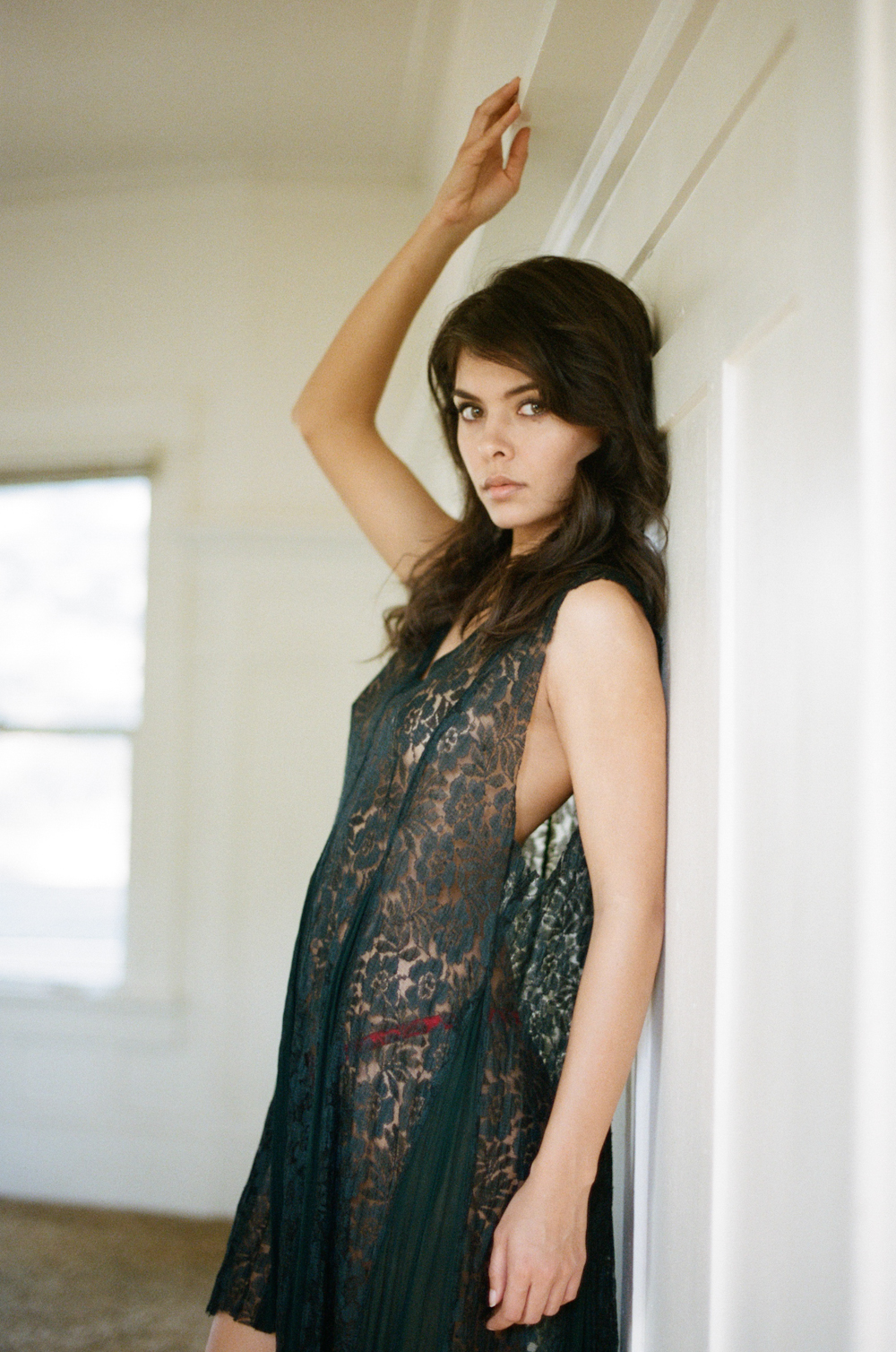 Black lace dress in a bohemian boudoir session by Briana Morrison