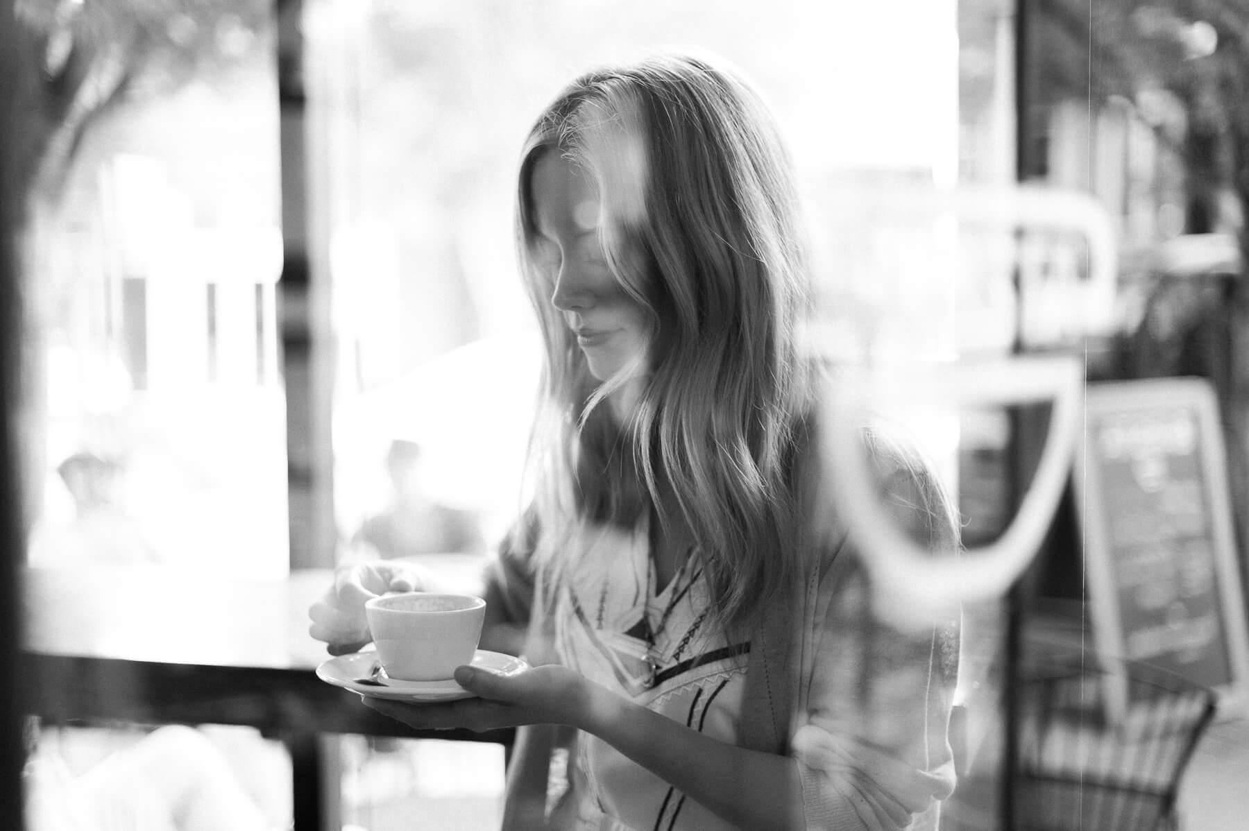 Claire Coffee sipping a drink at Barista in Portland, Oregon. Photo by Portland Portrait Photographer Briana Morrison
