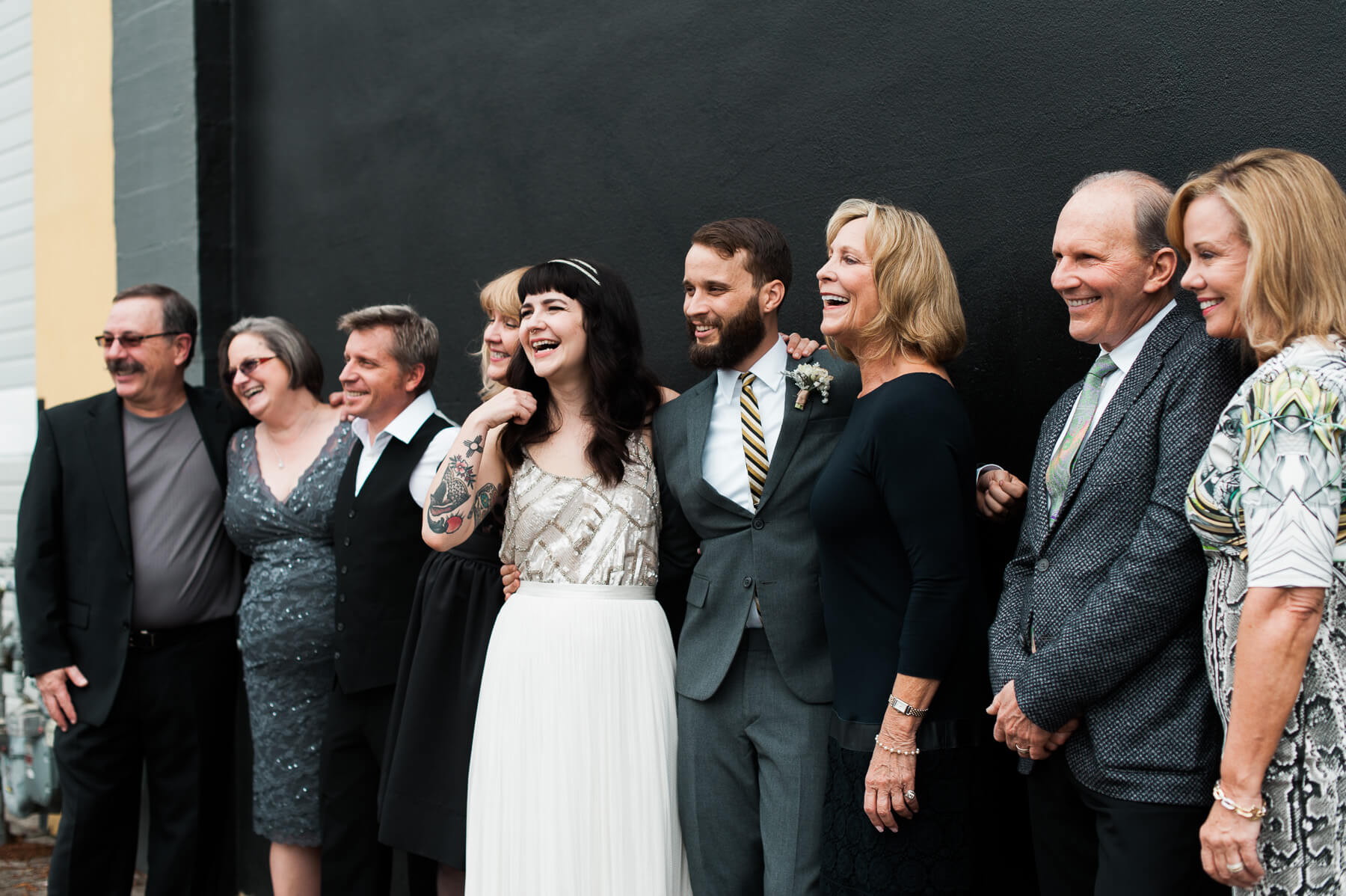 Lots of laughter during family photographs at a Portland, Oregon wedding. By Portland Holocene Wedding Photographer Briana Morrison