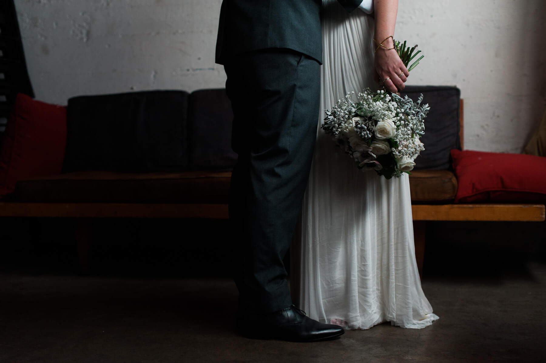A sweet detail of a bride and groom at Holocene in Portland, Oregon. Photography by wedding photographer Briana Morrison