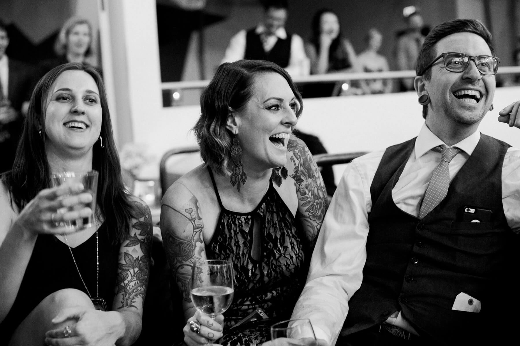 Wedding guests enjoy themselves at a Portland Holocene event. Photography by Briana Morrison