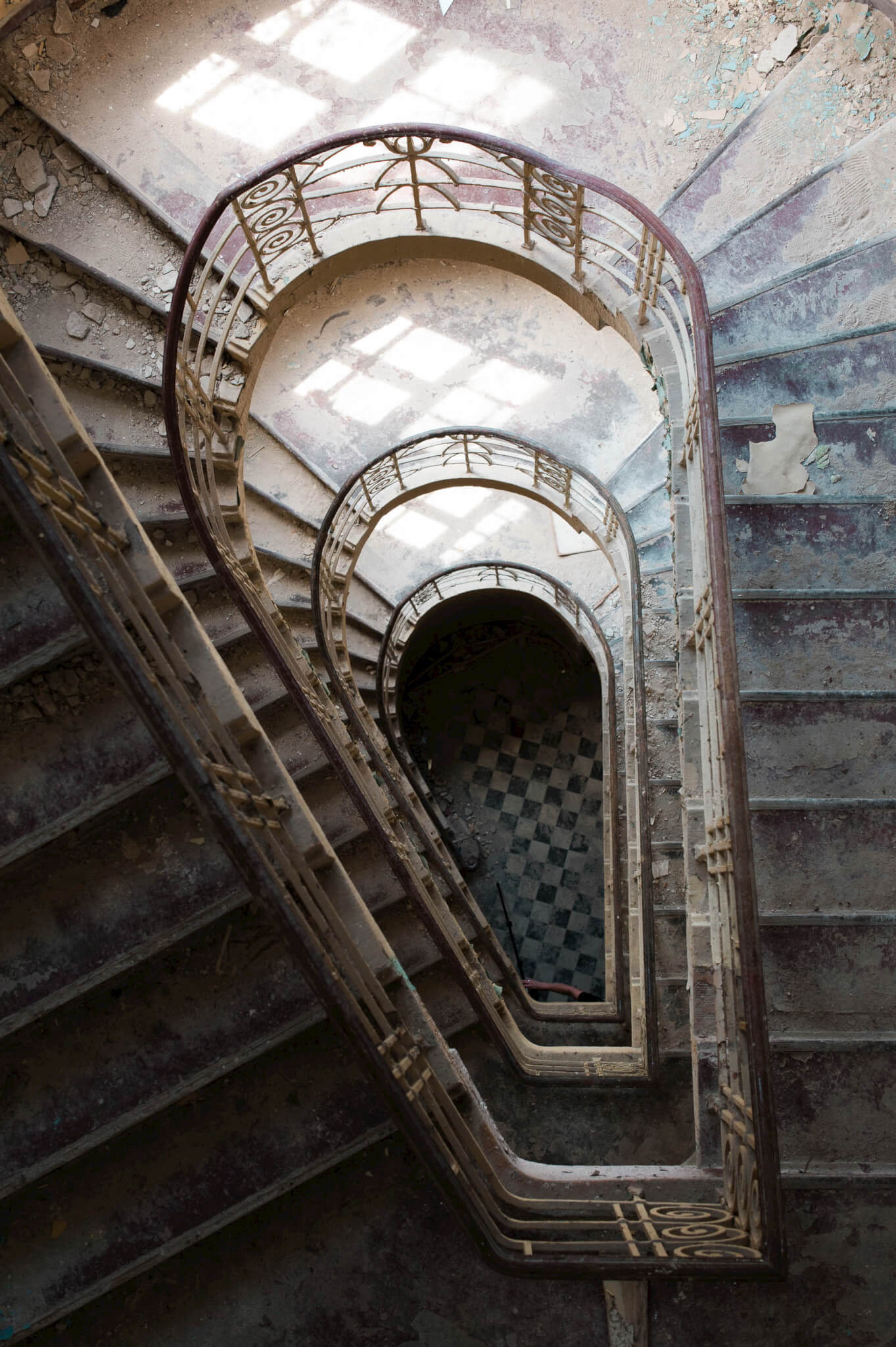 An old stairway inside Heilstätten Hohenlychen Sanatorium in Lychen, Germany. Photographs by Berlin Portrait Photographer Briana Morrison