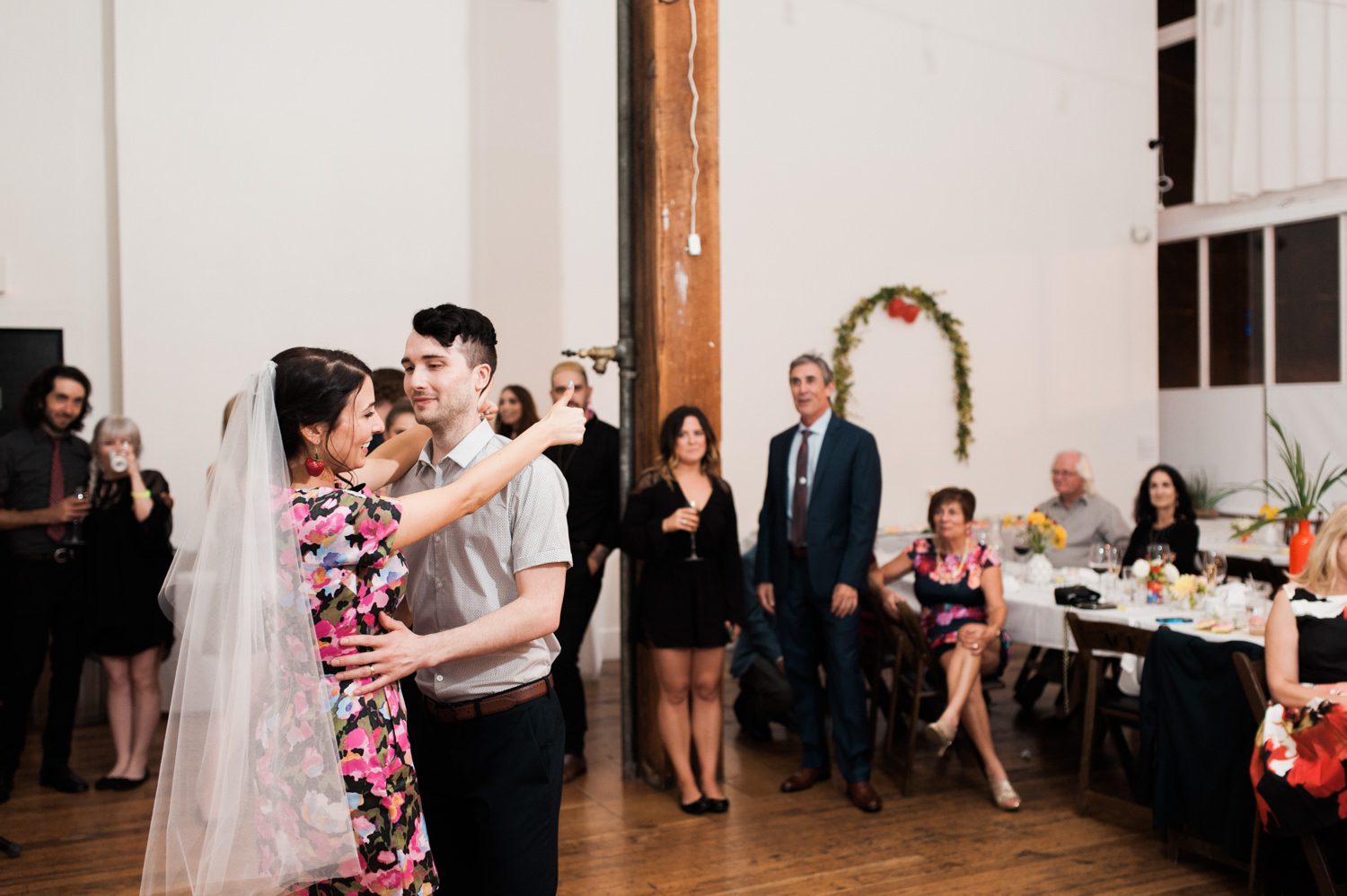 The bride and groom have their first dance. The Cleaners wedding photographer Briana Morrison