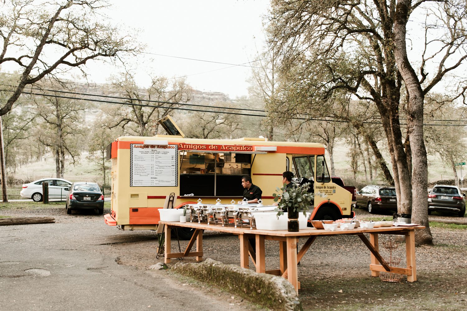 A taco truck prepares dinner for the wedding guests. By West Coast wedding photographer Briana Morrison