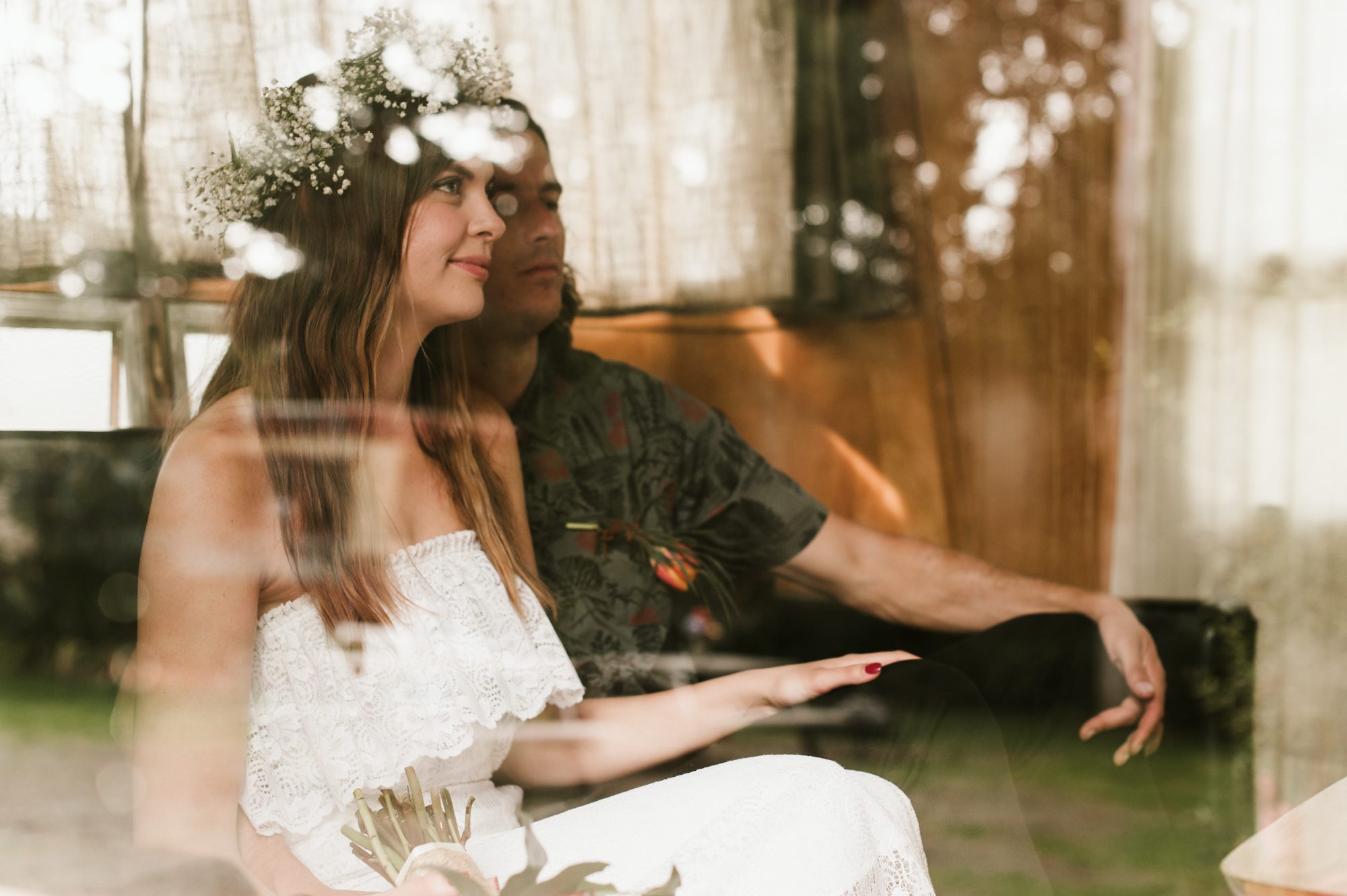 A portrait of the bride and groom with reflections surrounding them. By Long Beach, Washington wedding photographer Briana Morrison