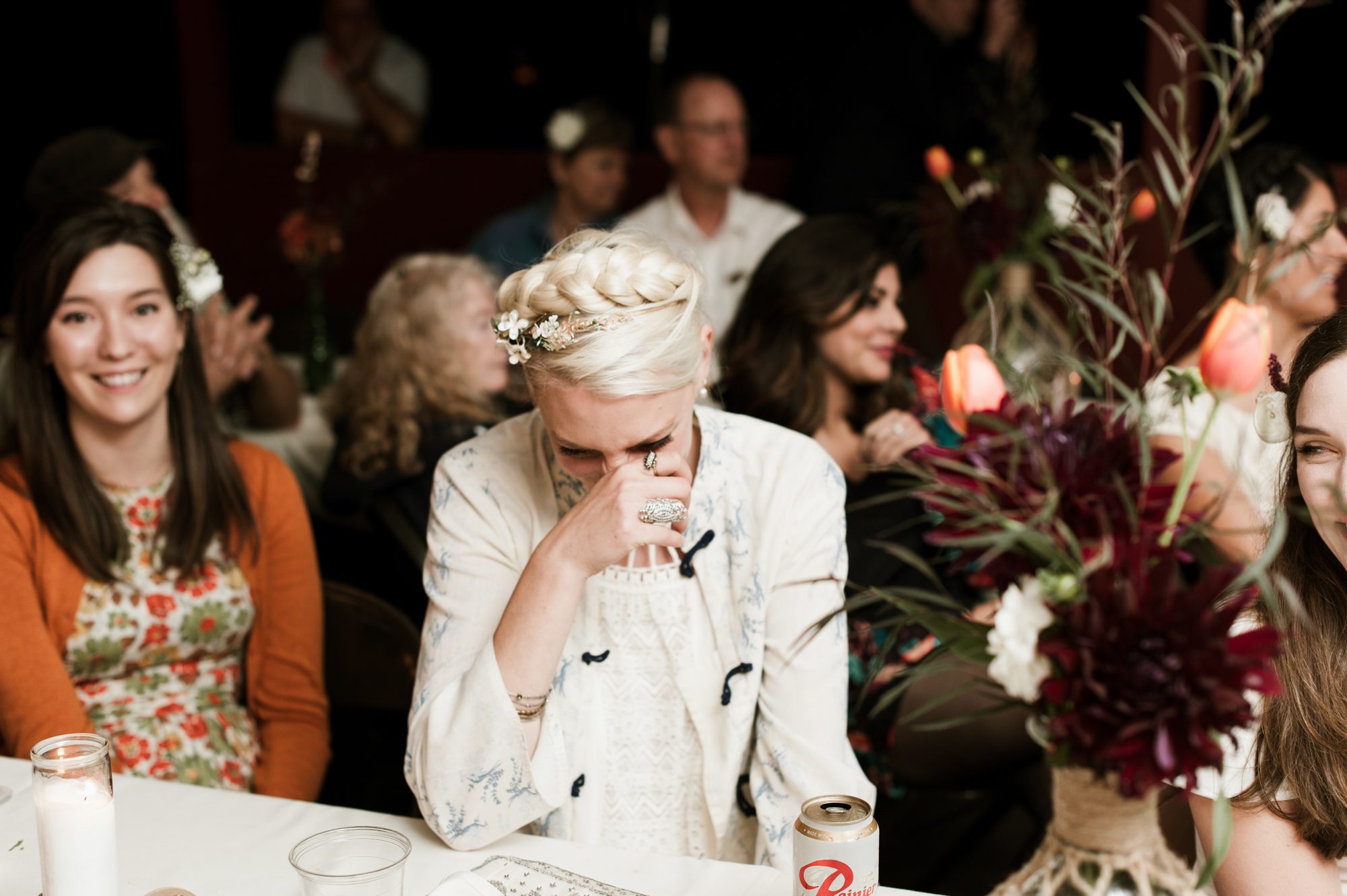 A wedding guest busts up during a speech. By Sou'Wester wedding photographer Briana Morrison