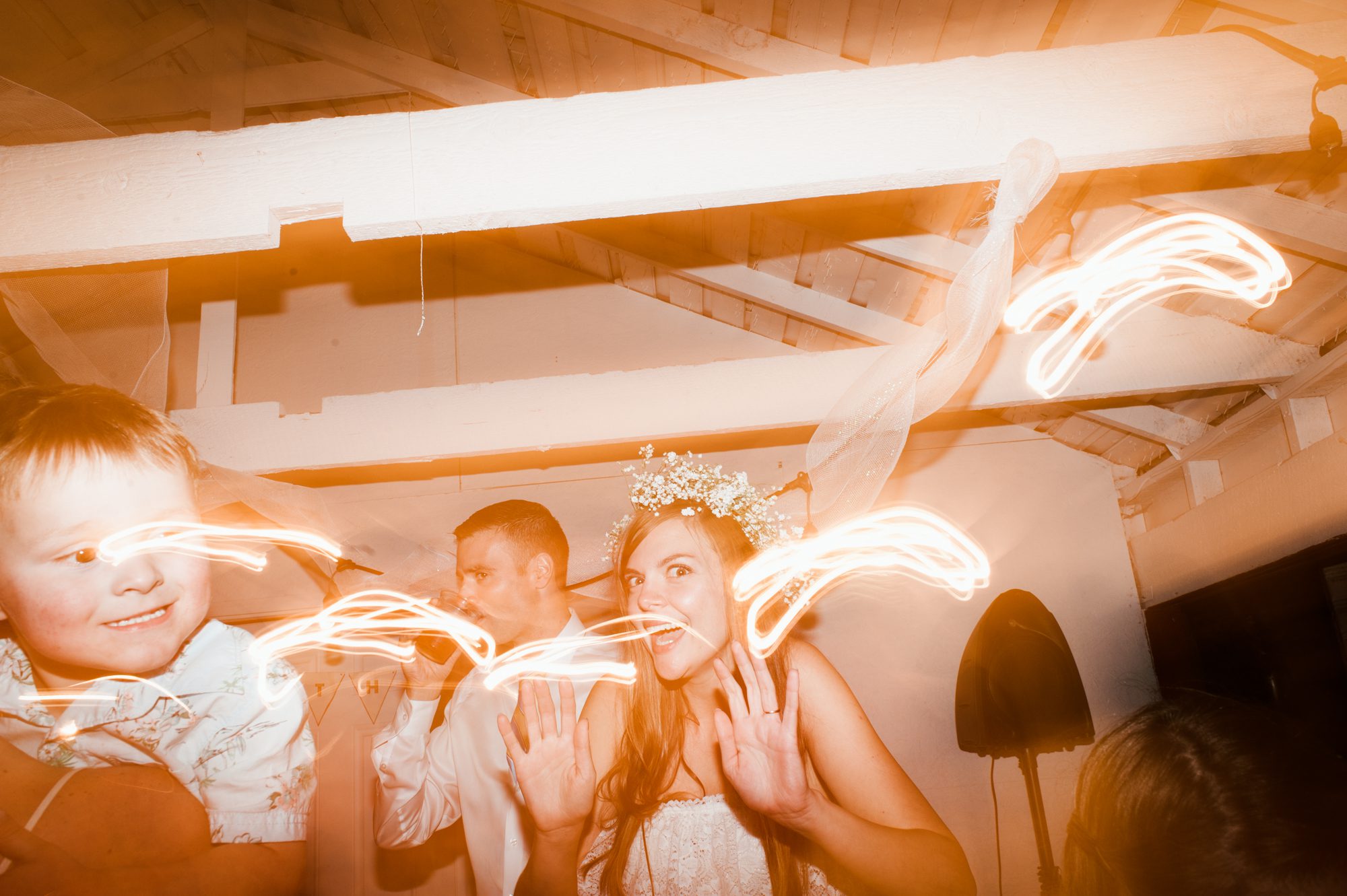 The bride busts a move during a wedding dance party. By Sou'Wester wedding photographer Briana Morrison