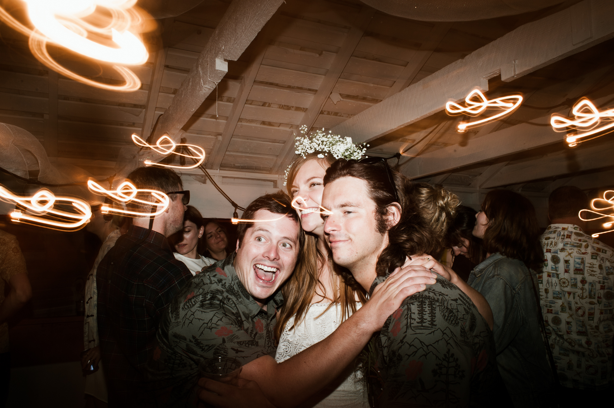 Groomsman photobombs the bride and groom during a dancing portrait. By Sou'Wester wedding photographer Briana Morrison