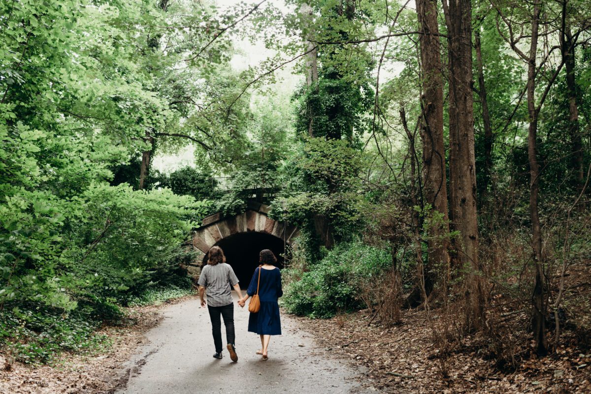 A young couple walk through Prospect Park for their Brooklyn NY engagement portraits.