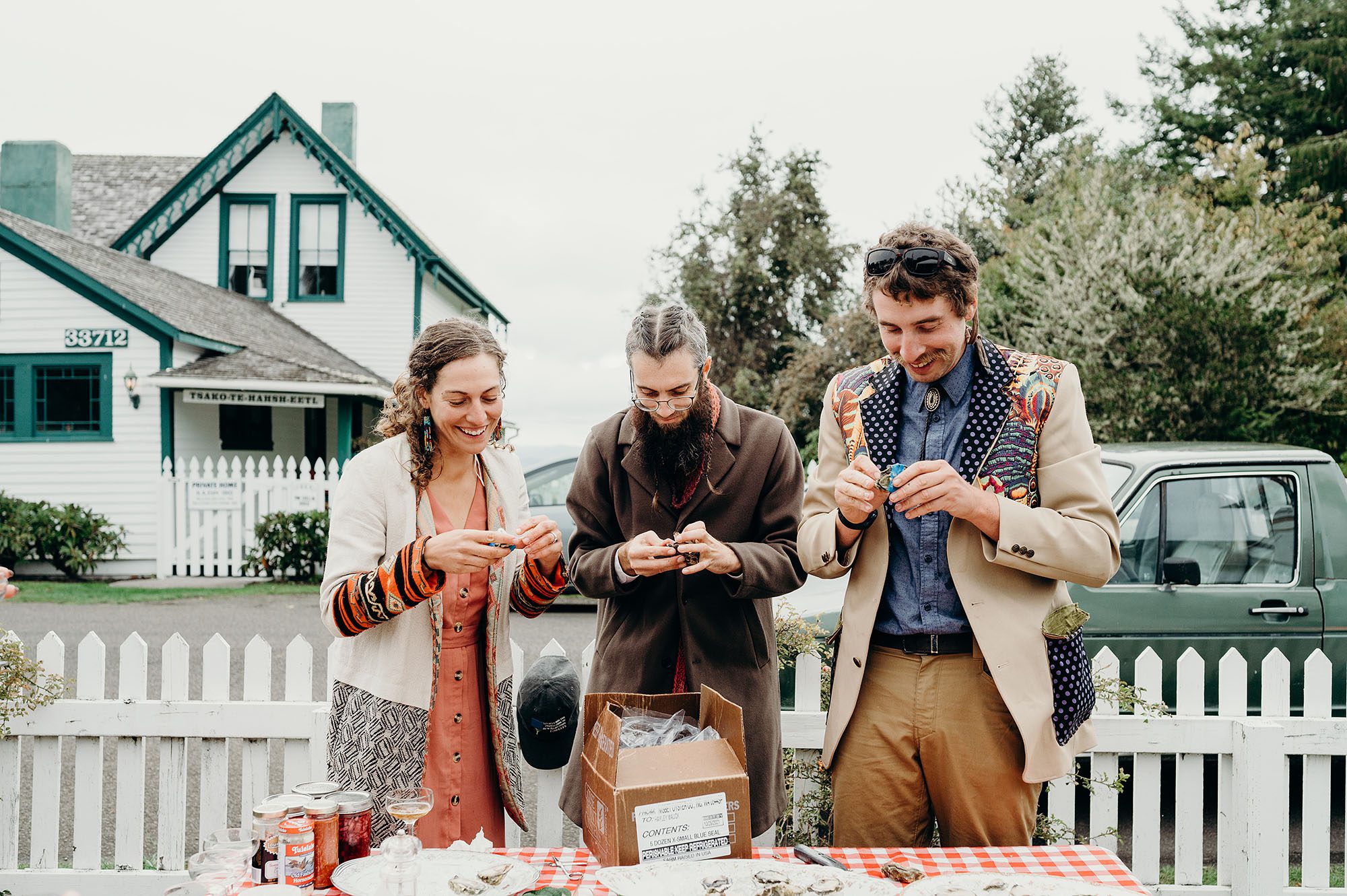 Long Beach Peninsula Wedding Guests Eating Oysters by Briana Morrison Photography