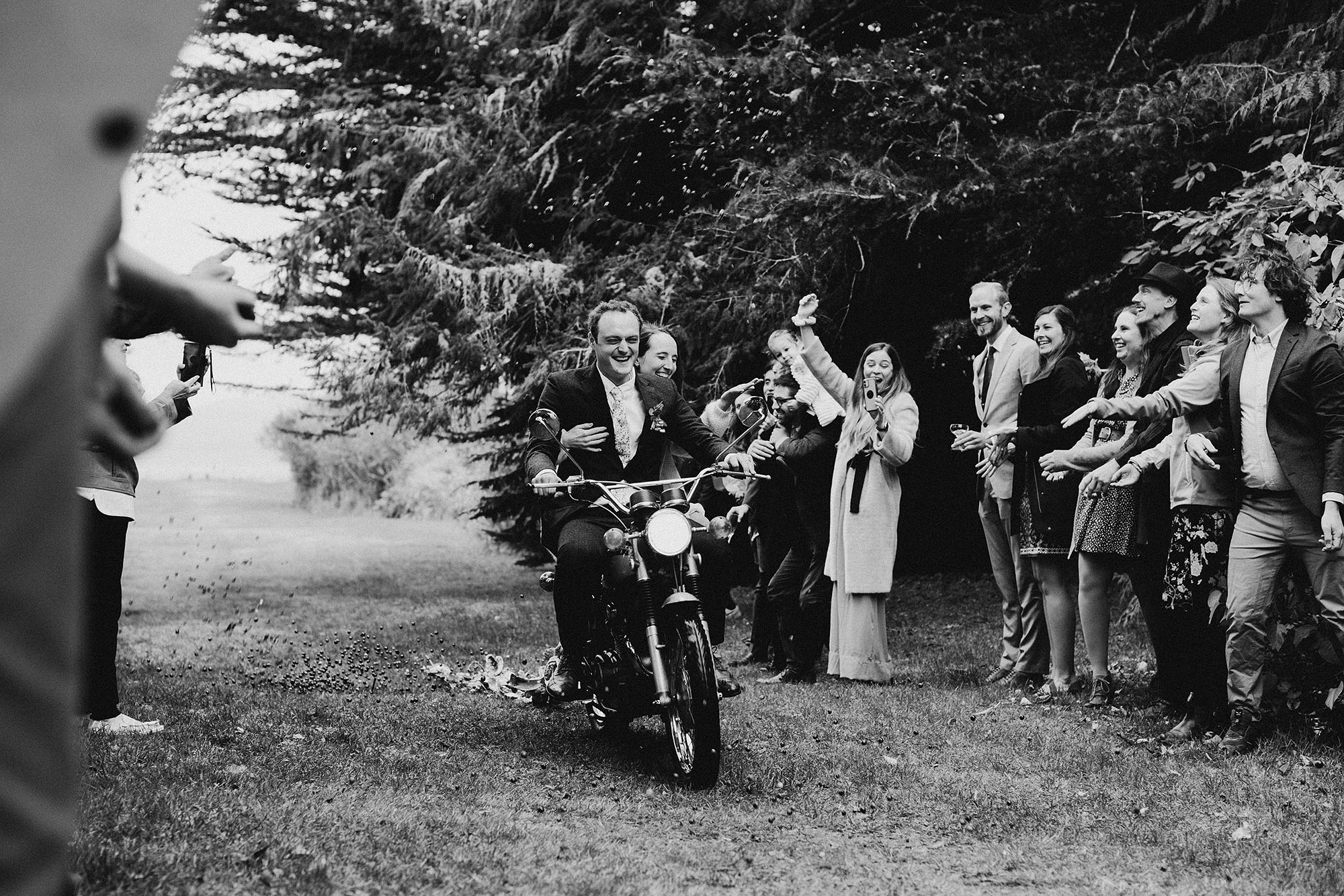 Long Beach Peninsula Wedding Groom Riding with Bride on Motorcycle by Briana Morrison Photography