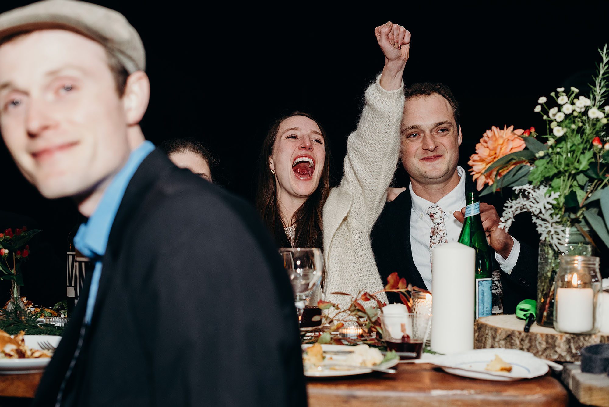 Long Beach Peninsula Wedding Bride Cheering at Reception by Briana Morrison Photography