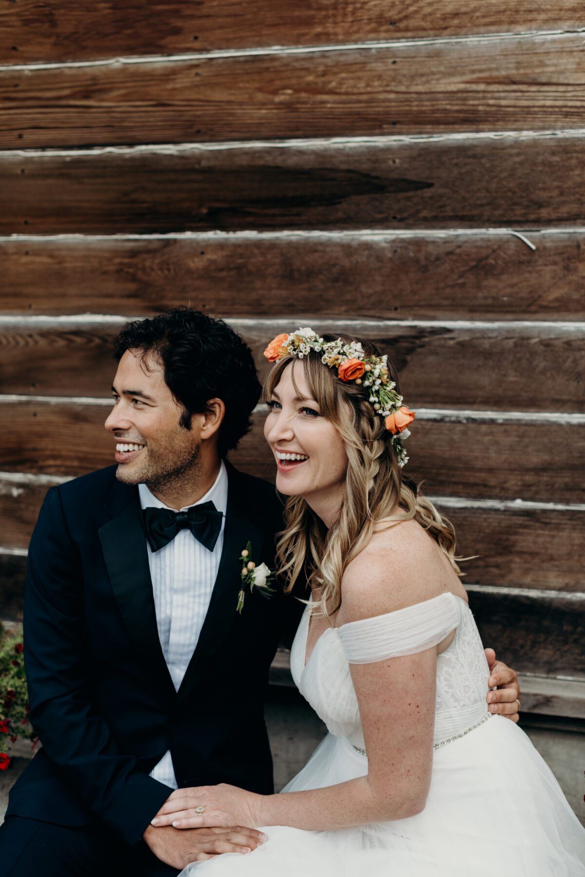 cute candid portrait of a newlywed couple smiling on their wedding day