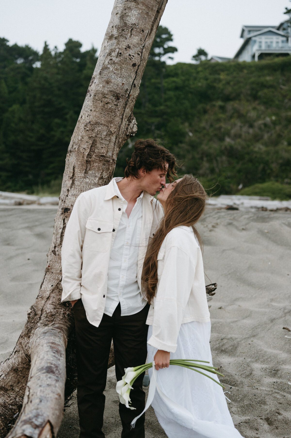 Salmonberry Inn wedding photography of a bride and groom on the beach. Take by Briana Morrison - a Portland, OR based photographer.