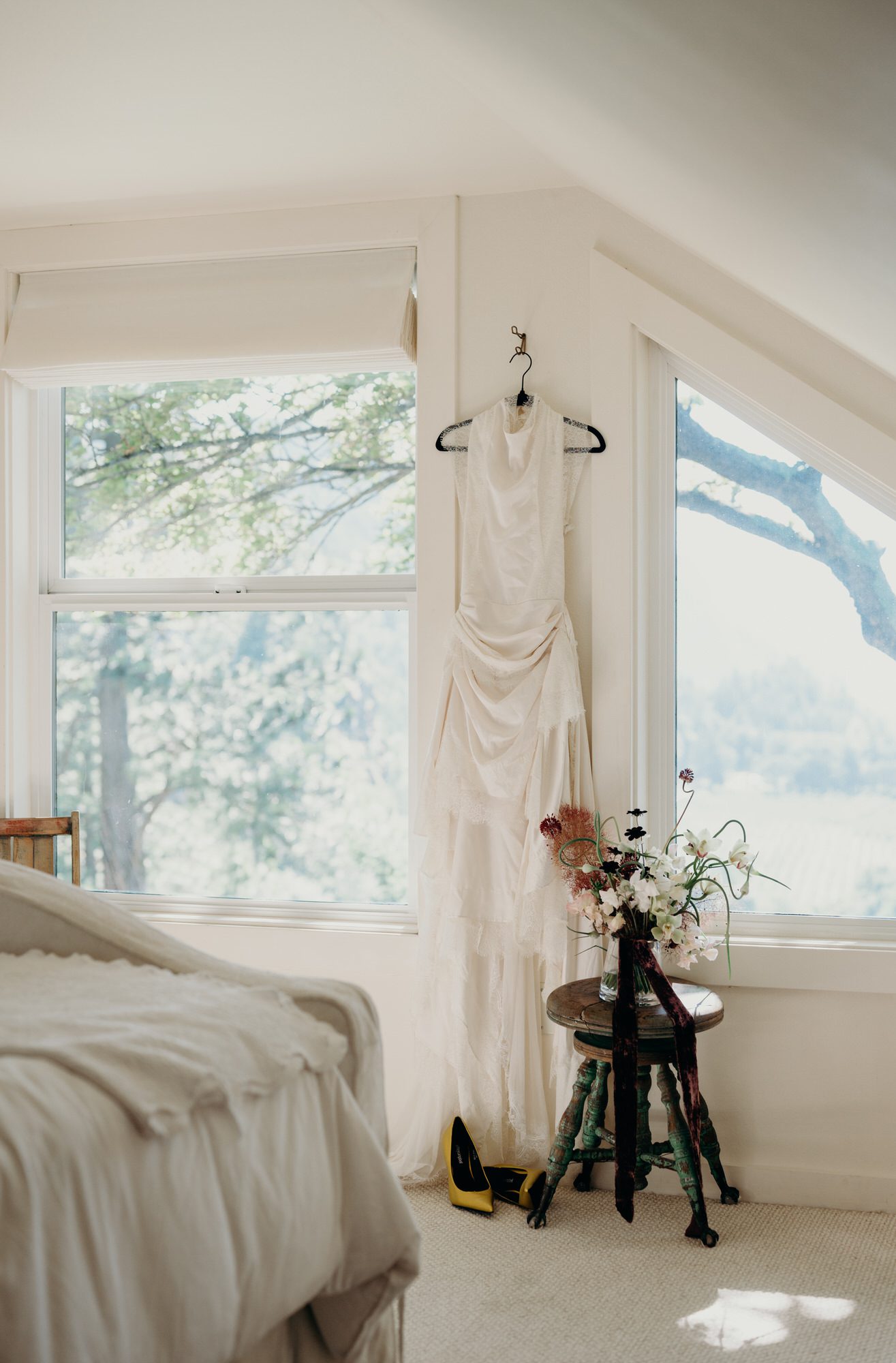 Details of the wedding dress and bouquet at Griffin House in Hood River, Oregon by Briana Morrison