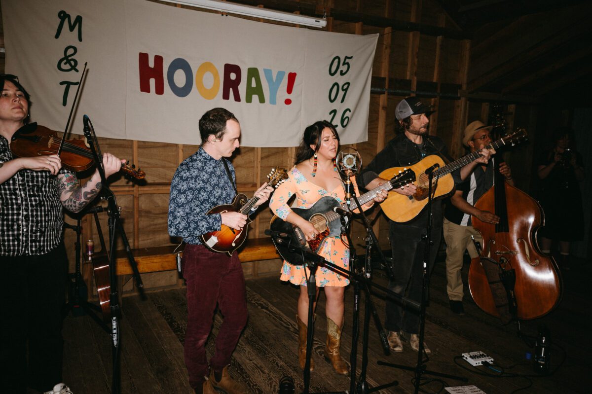 A live band provides entertainment for this Camp Namanu wedding. Photography by Briana Morrison